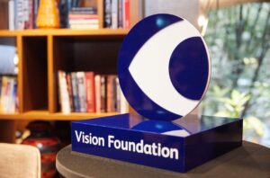 Vision Foundation logo as 3D model on a plinth