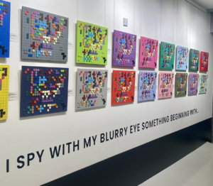 "I spy with my blurry eye..." wall featuring a colourful mix of braille art.